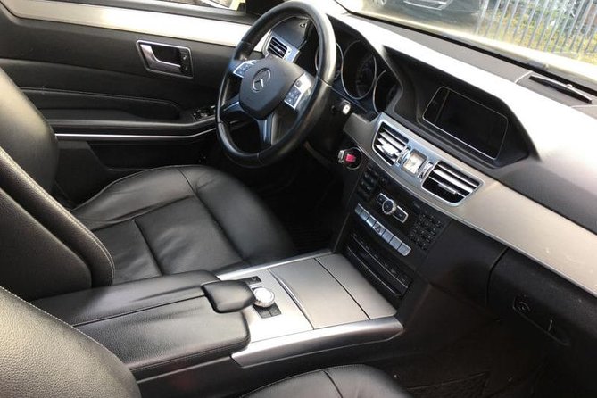 Athens City Centre to Int. Airport of Athens - The Mercedes E200 setup: what you’ll ride and how many people fit