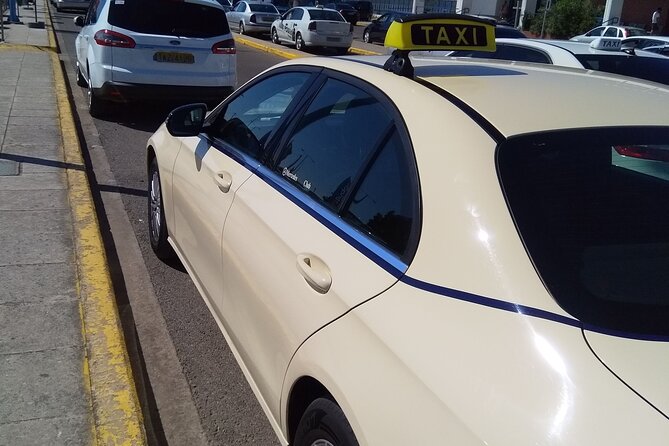Athens City Centre to Int. Airport of Athens - What’s included: Wi-Fi, chargers, water, and bottled comfort