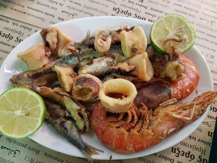 Athens: Guided Tour of 10+ Tastings of Authentic Greek Food - Koulouria and a savory pastry: simple Athens classics