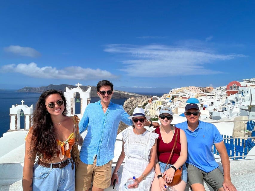 Day Trip to Santorini From Athens - Oia village: blue domes, cliffs, and where your time can vanish