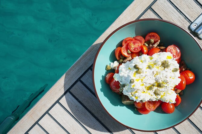 Luxury Catamaran Full Day Private & Greek Gastronomy in Athens - Stop 1: Aegina with the first swim-and-eat rhythm