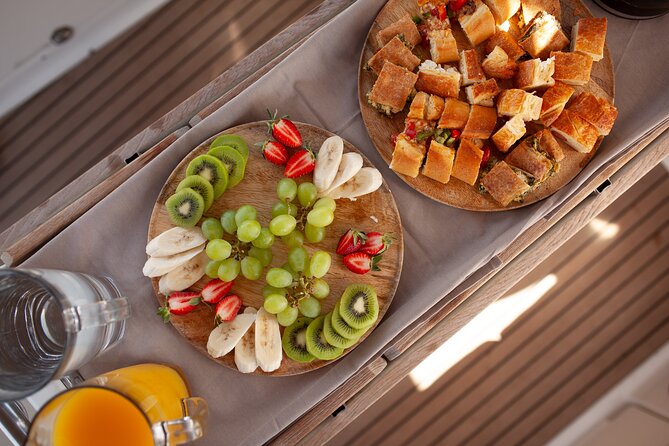 Luxury Catamaran Morning Private & Greek Gastronomy in Athens - What you actually get onboard: included meals, drinks, and gear