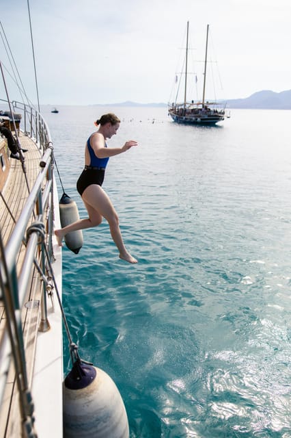 Sunset Dinner Cruise: Swim Stop, Drinks & Onboard Dining - Vouliagmeni Pass-By and the Big Sunset Window